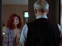 Slutty redhead shows some awesome side boob cleavage and gets pressed against the wall by an old man in this sexy celeb video.
